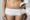 Liposuction before and after showcasing dramatic belly fat removal and a sculpted, natural appearance.