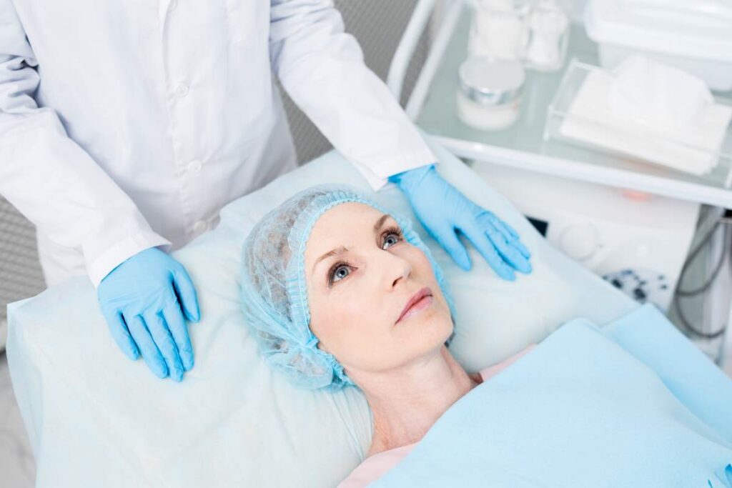 A plastic surgeon performing rhinoplasty, focusing on achieving natural-looking results while preserving facial harmony.