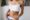 Before and after results of tummy tuck, highlighting body contouring improvements.