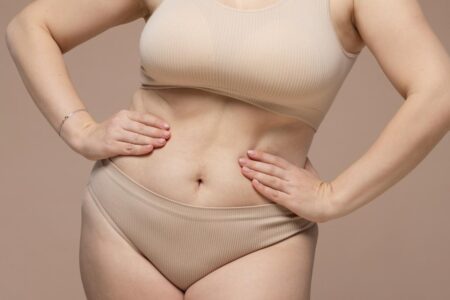 Patient consultation for tummy tuck vs. skin tightening with Dr. Ulaş Bali