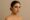 Female patient with sculpted abdomen and lifted curves after BBL and liposuction in Turkey.